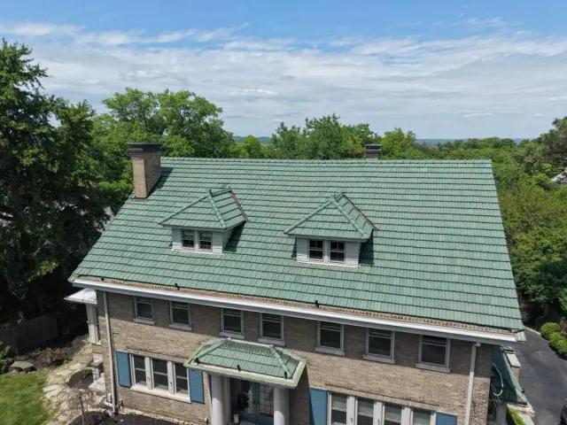 Aerial view of a green Ludowici clay tile roof in Paddock Hills, Cincinnati