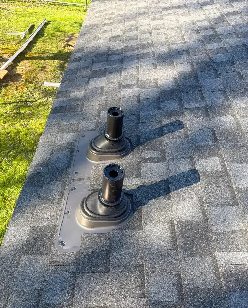 New pipe boots on a replacement asphalt shingle roof