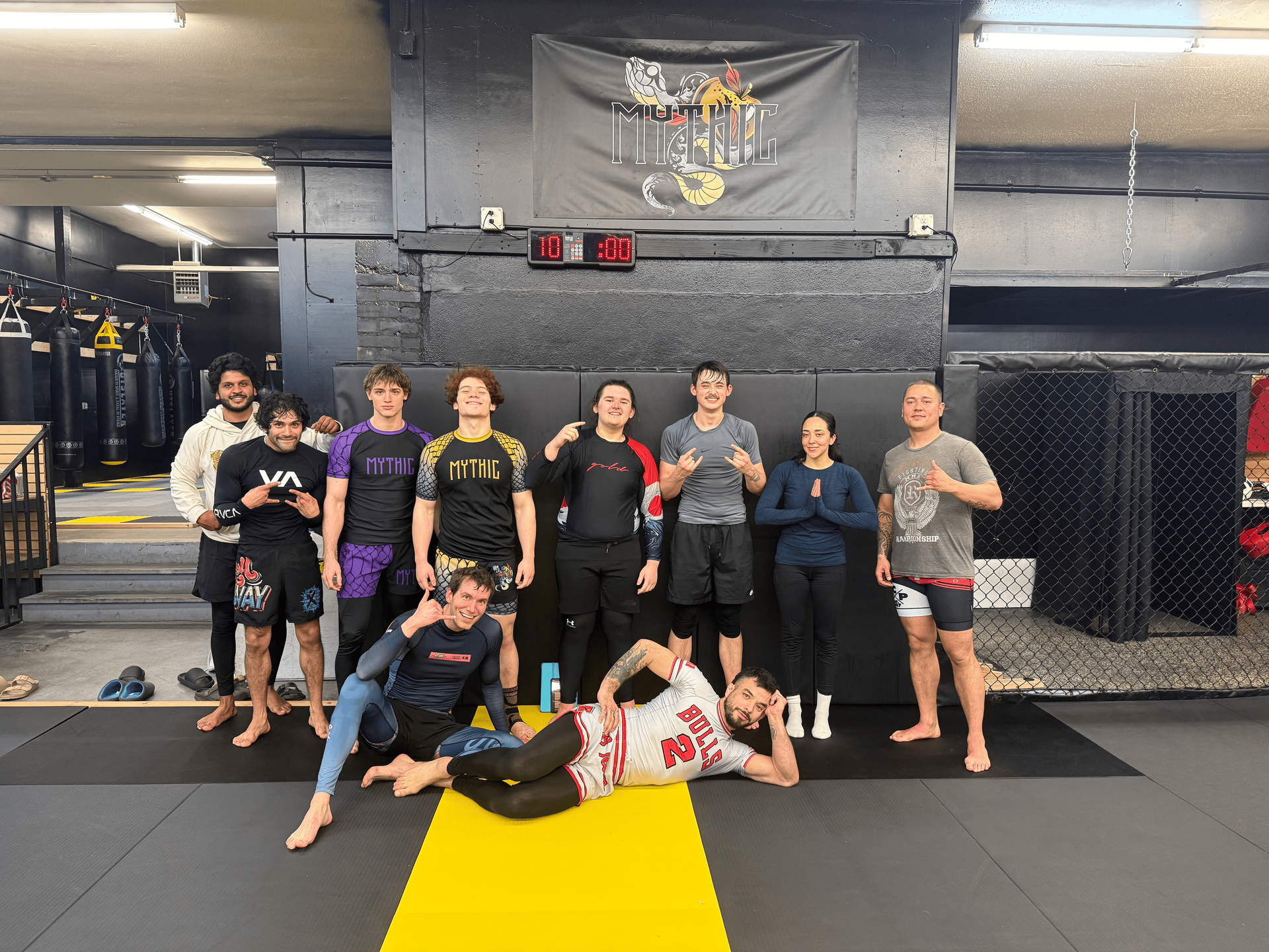 Adults drilling Brazilian Jiu-Jitsu techniques at Mythic Martial Arts in Tacoma, WA.