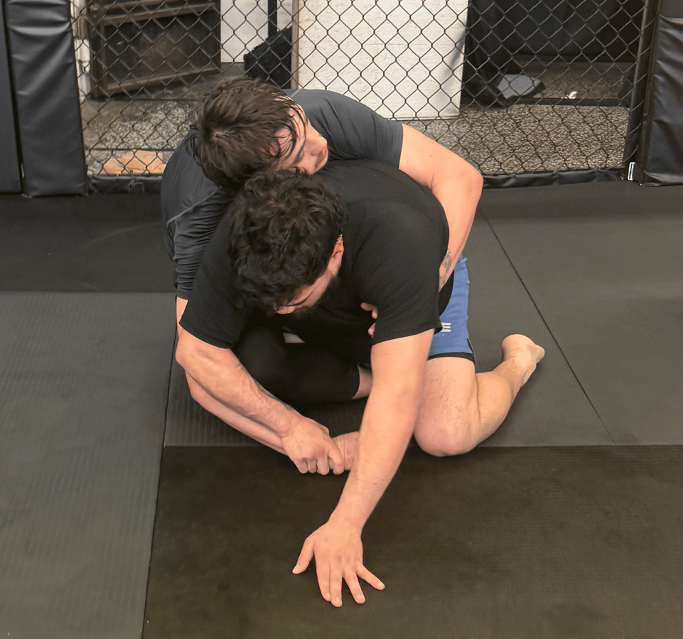 Adults drilling Brazilian Jiu-Jitsu techniques at Mythic Martial Arts in Tacoma, WA for fitness.