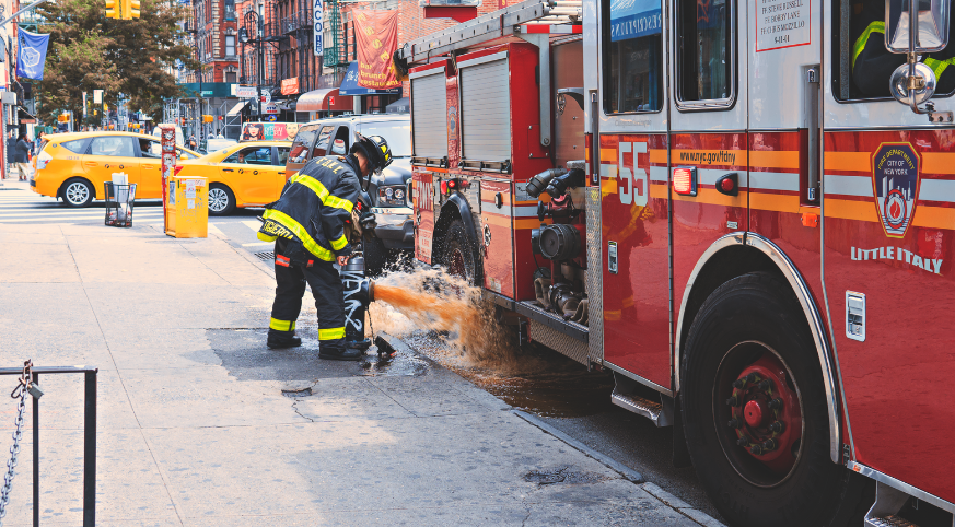 A fire truck is parked on the side of the road.