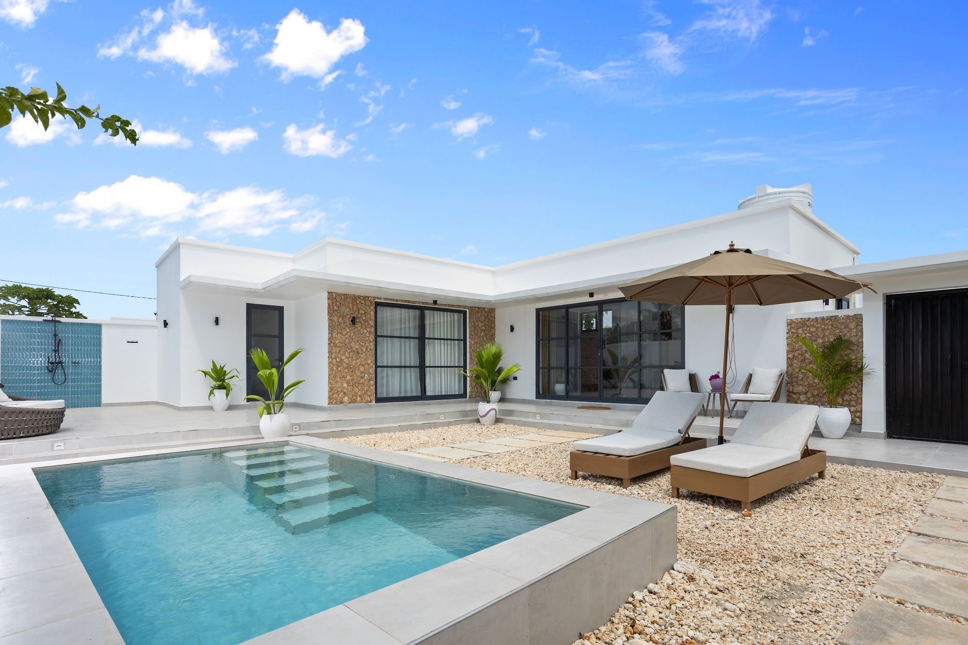 Amethisto villa exterior with private pool and sun loungers