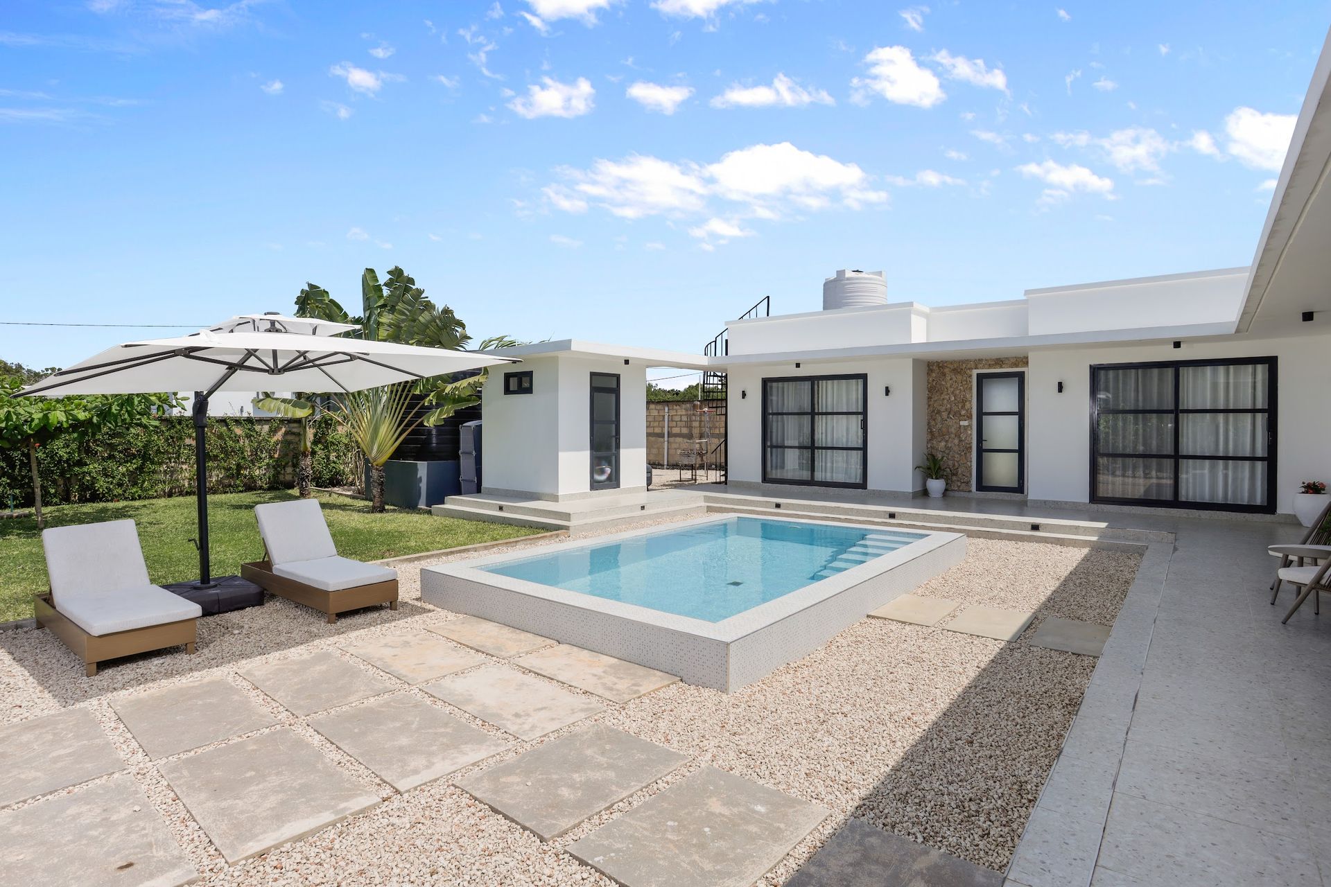Lulu villa exterior with private pool and sun loungers