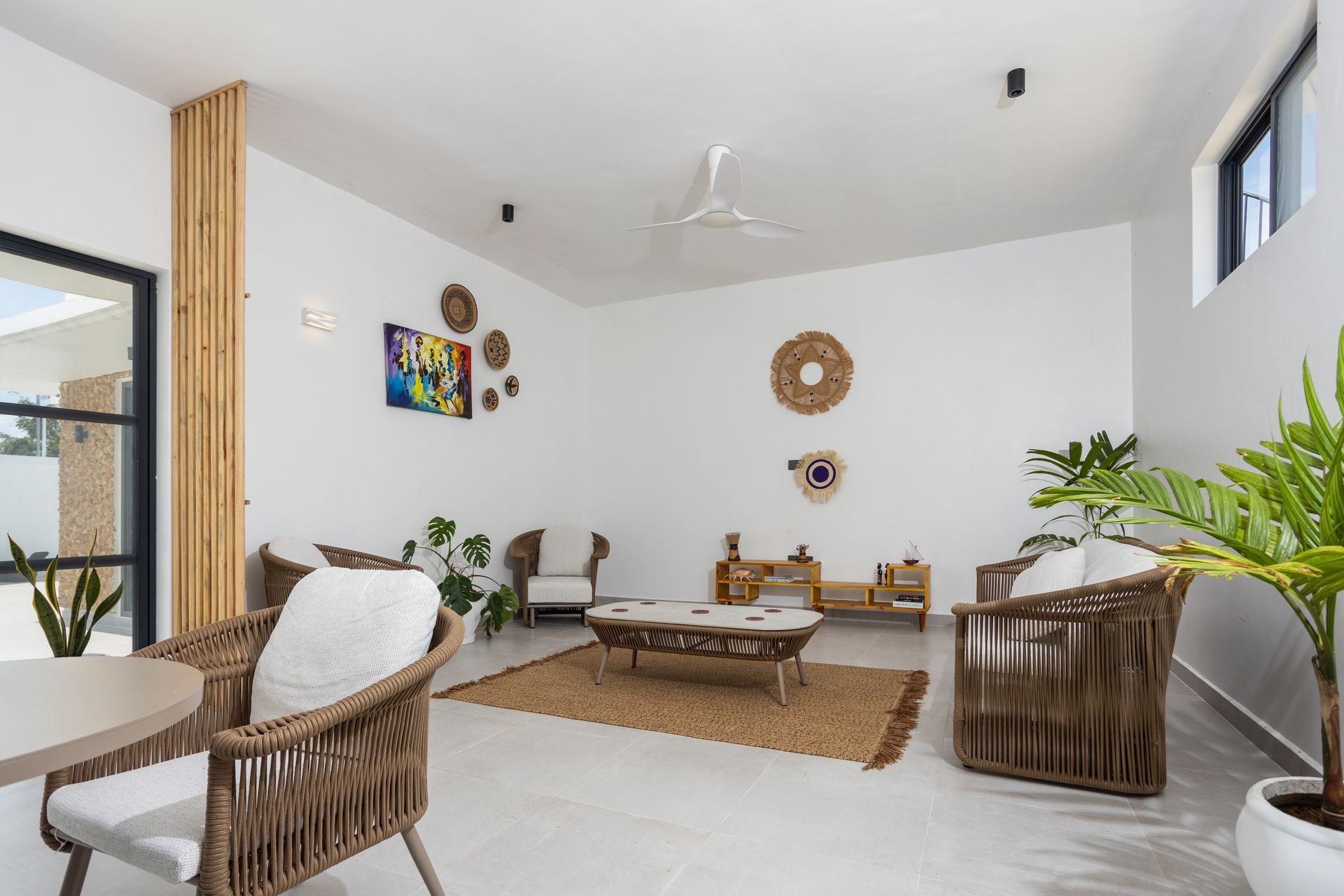 Open-plan living area looking out to the pool