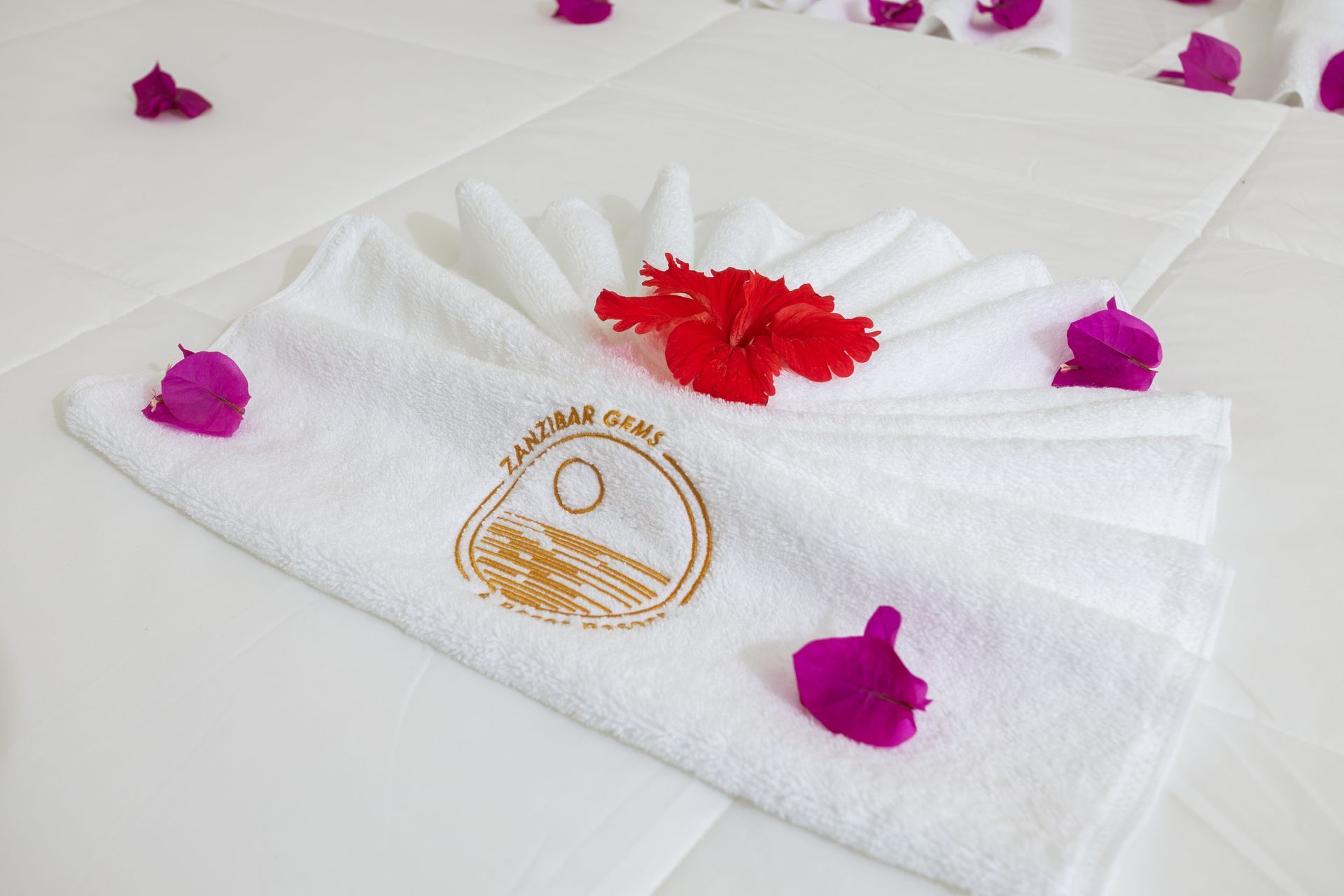 Turndown detail with fresh flower petals