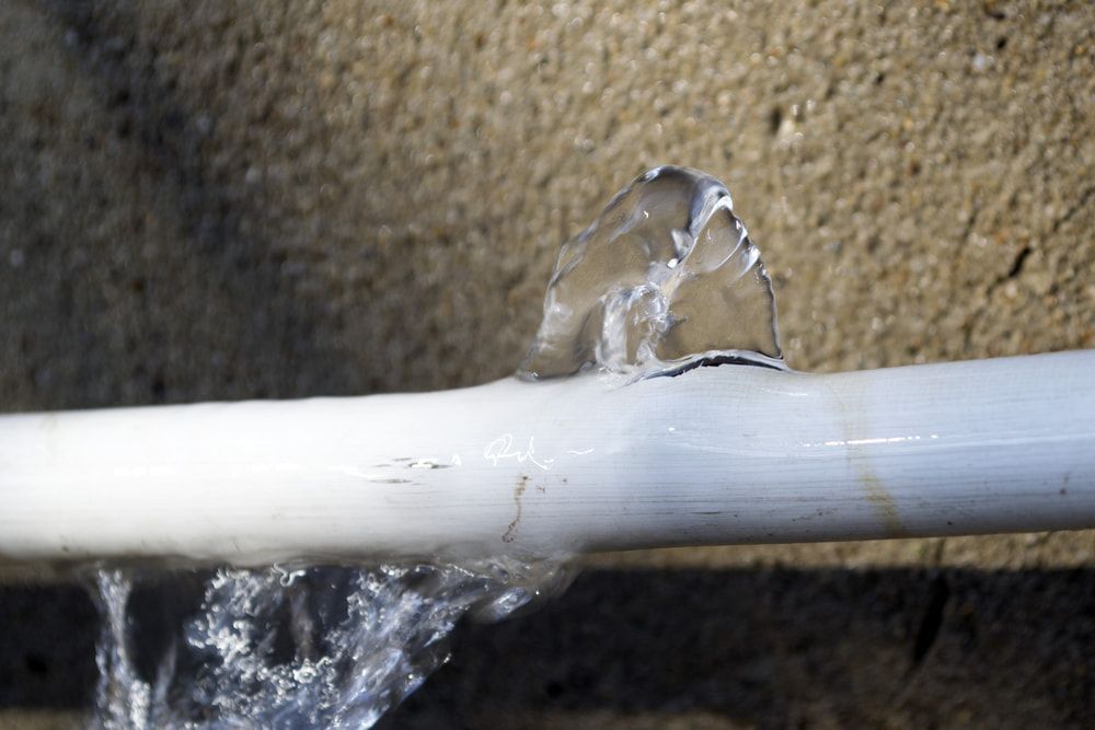Water is Coming Out of a Hole in a Pipe — Mainline Plumbing & Civil Pty Ltd in Dubbo, NSW