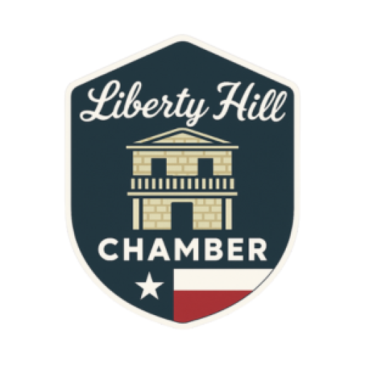 Liberty Hill Chamber logo: dark blue shield with a two-story building, white text, and Texas flag.