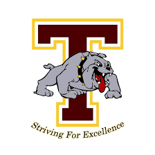 Bulldog mascot with spiked collar in front of a maroon