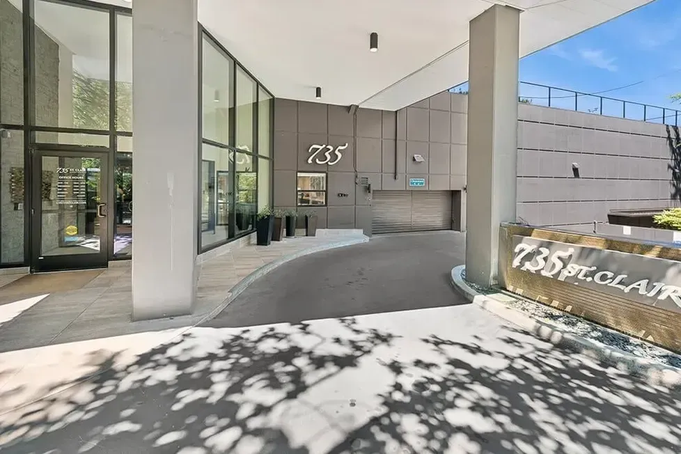 A large building with a sign that says 735 on it