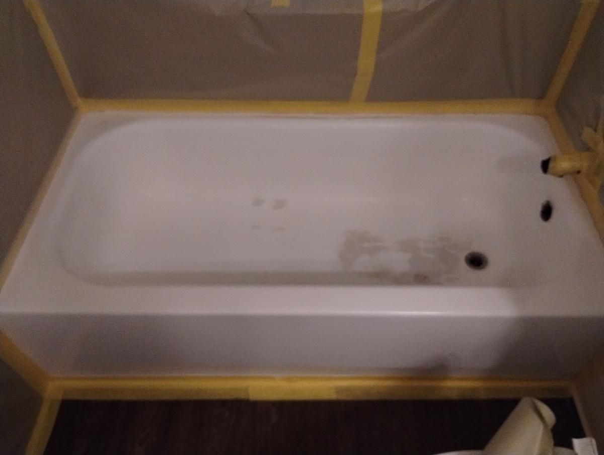 a bathtub in a bathroom 