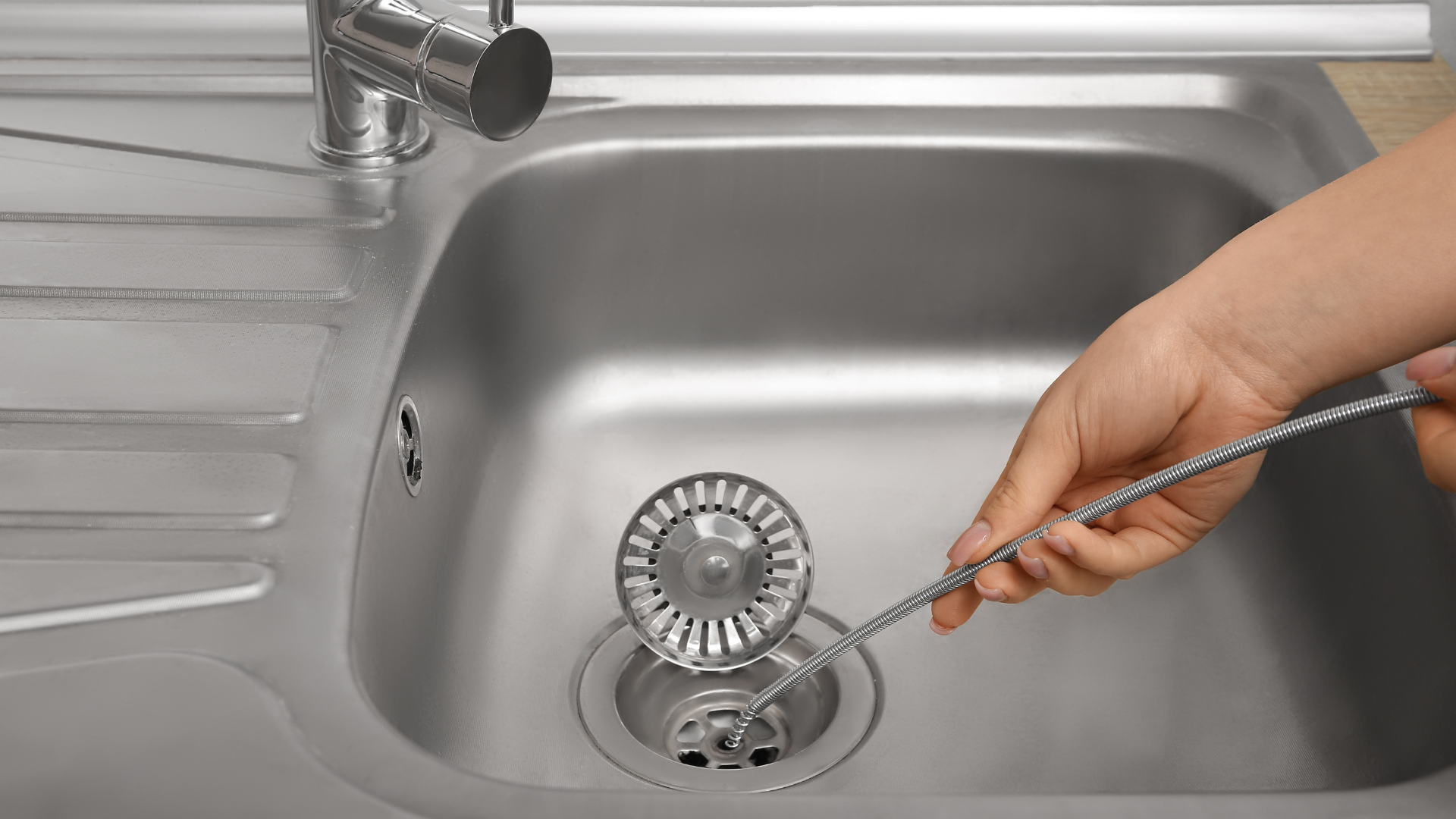  slow draining sink showing drain clog problems in Connecticut home