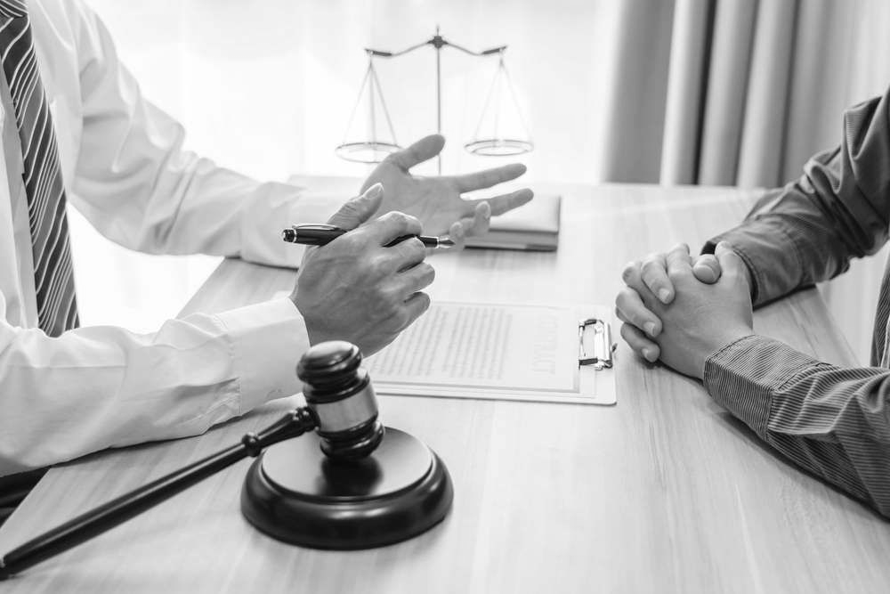 Criminal Lawyer In Robina Consulting Client About Legal Matters