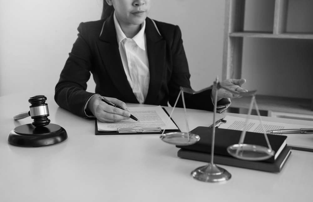 Divorce Lawyer In Robina Reviewing Legal Documents At Office