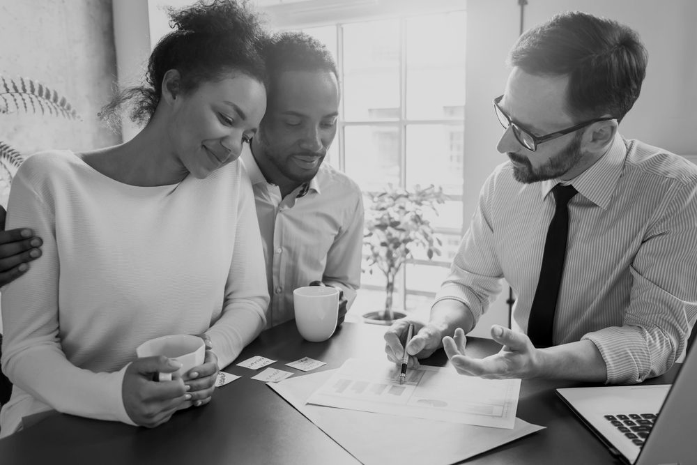 Family Lawyer In Robina Advising Couple During Legal Consultation