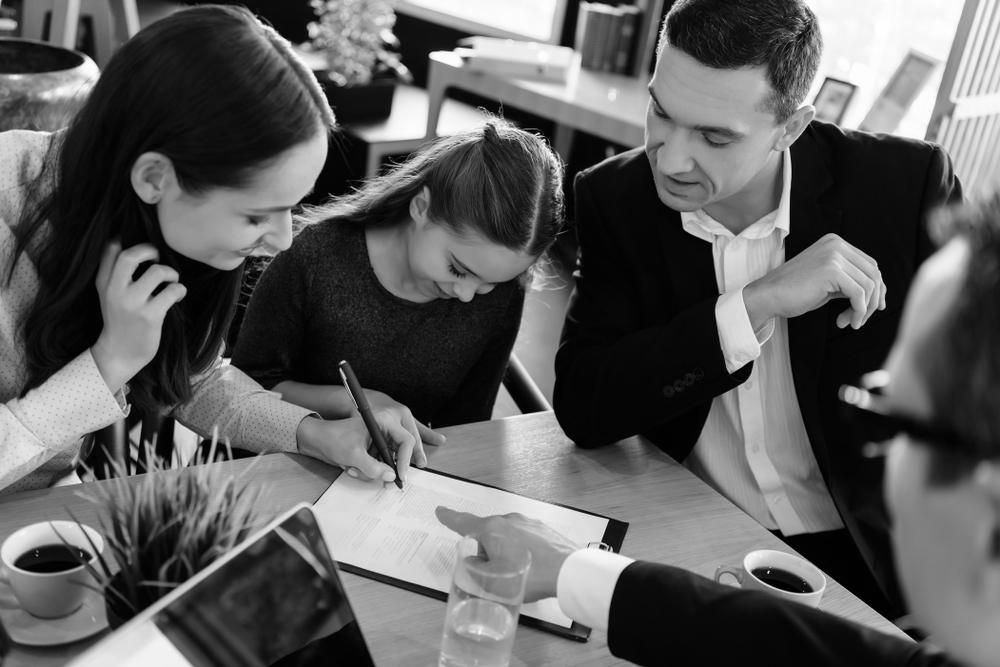Family Lawyer In Robina Assisting Family With Legal Documents