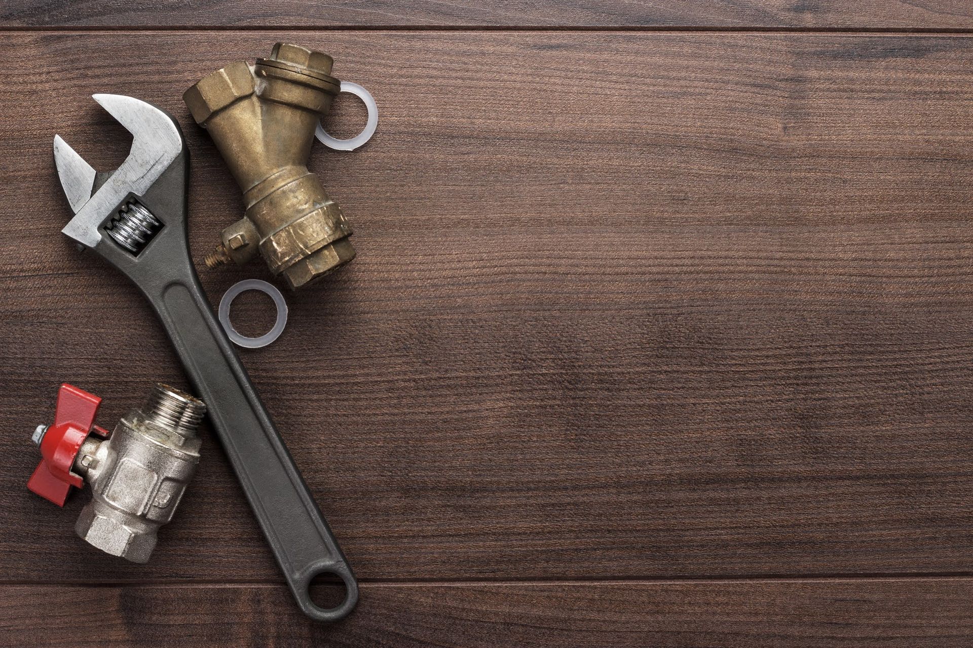 Plumbing Tools on Table — Lisle, IL – Jim Dhamer Plumbing and Sewer, Inc. Plumbing Tools on Table — Lisle, IL – Jim Dhamer Plumbing and Sewer, Inc.