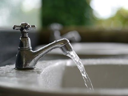 Water Tap — Lisle, IL – Jim Dhamer Plumbing and Sewer, Inc.