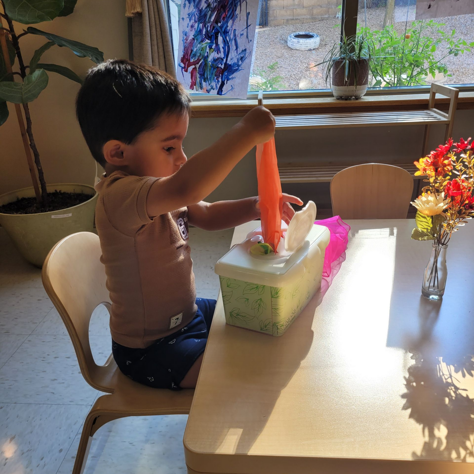 Montessori toddler working in the classroom