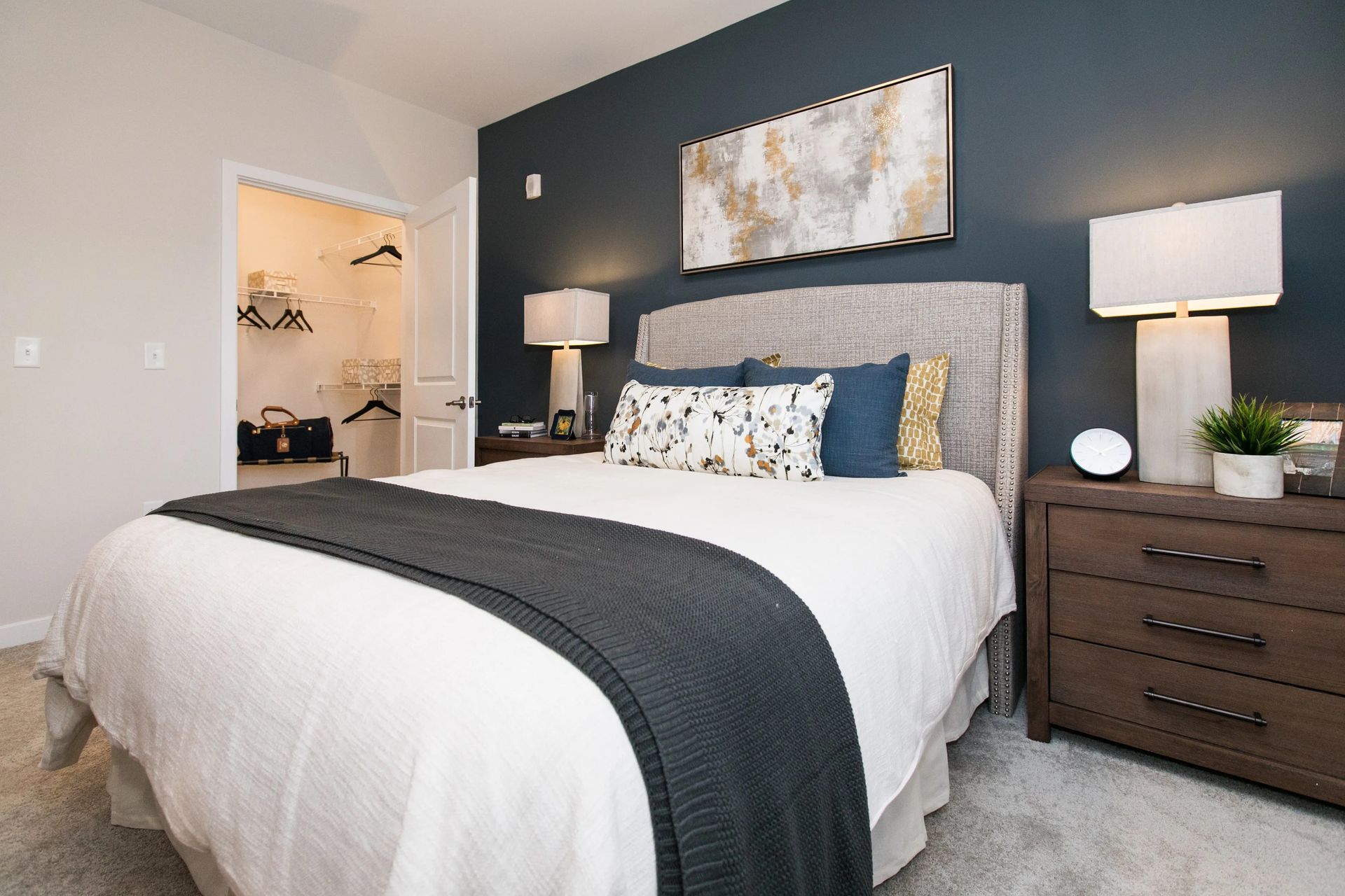 Carpeted bedroom at Verde at Howard Square.