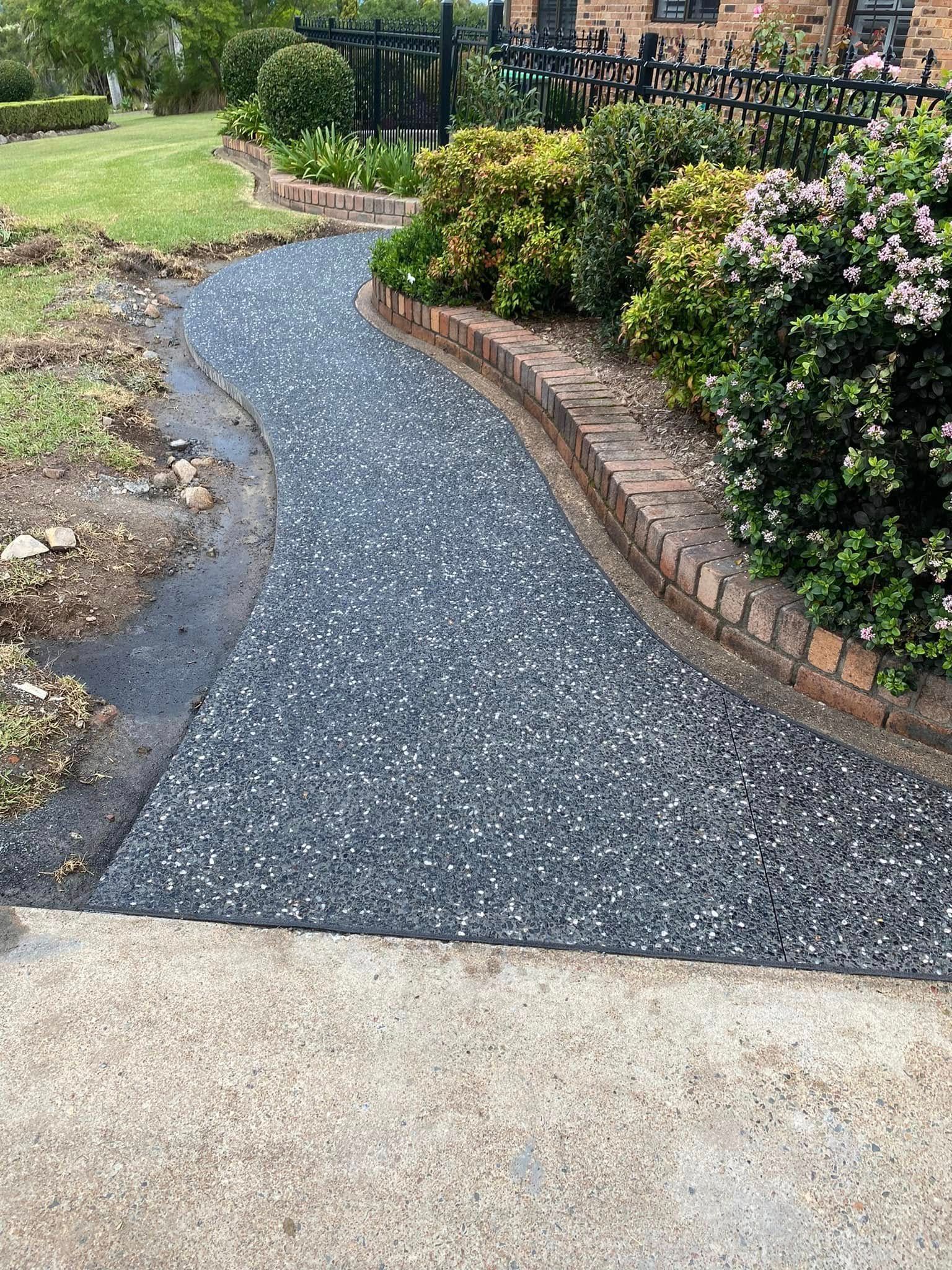 Close-up of a Speckled, Textured Surface of Small Pebbles — Rhyno’s Concreting In Old Bar, NSW