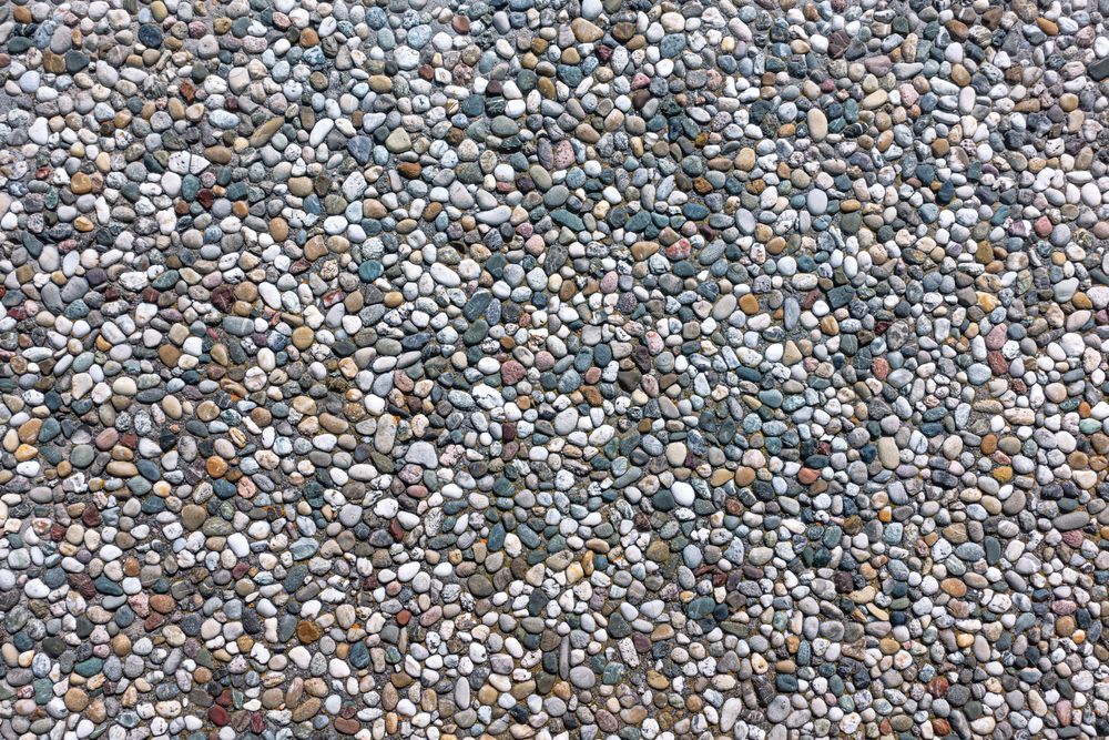 Close-up of a Surface Covered in Small, Multi-colored Pebbles — Rhyno’s Concreting In Old Bar, NSW