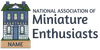 Logo for National Association of Miniature Enthusiasts with a small house and nameplate