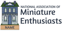 Logo for National Association of Miniature Enthusiasts with a small house and nameplate