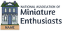 Logo for National Association of Miniature Enthusiasts with a small house and nameplate