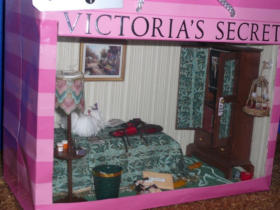 Victoria’s Secret toy bedroom set in pink packaging, showing a bed and dollhouse-style furniture