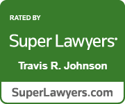 The logo for Super Lawyers Travis R. Johnson is green and white.