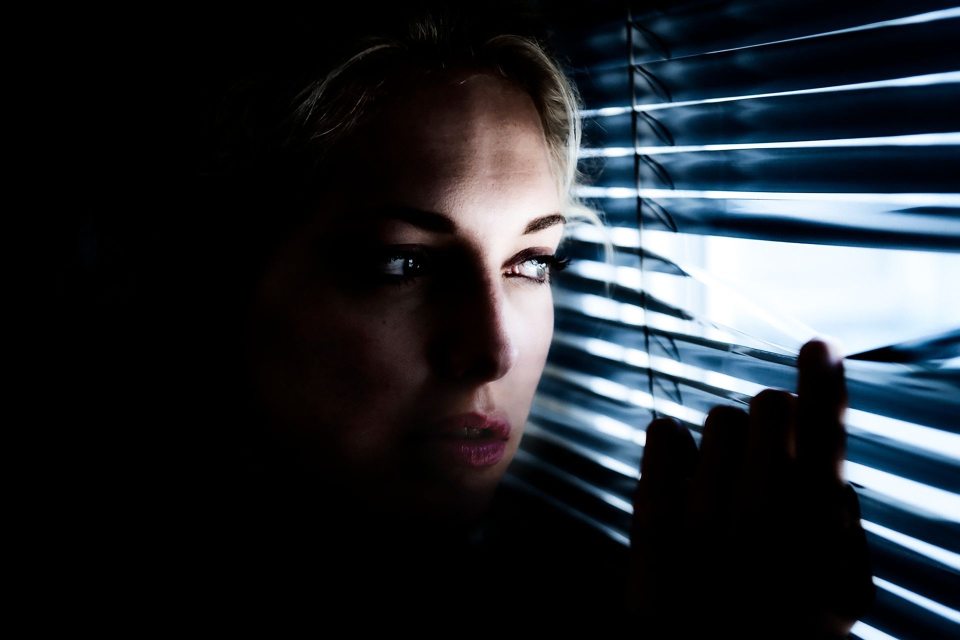 Artistic photos of July Janssen expressing emotion and narratives, often with a unique and non-commercial twist