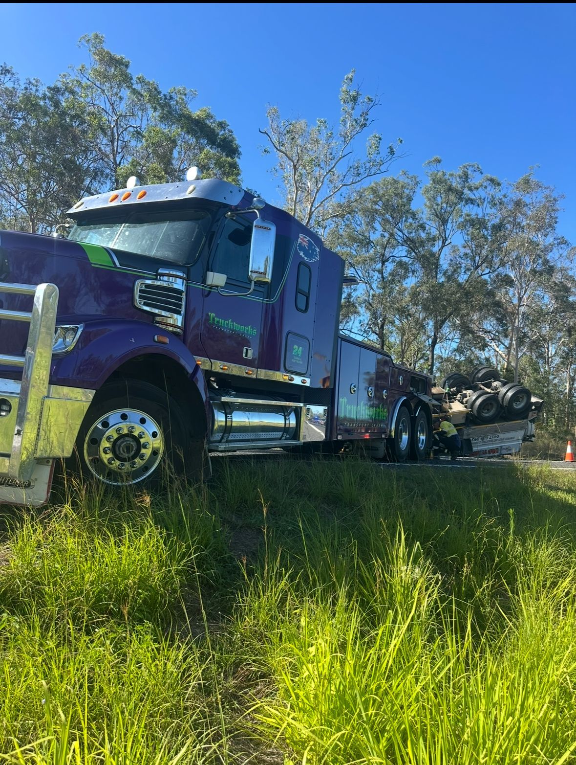 A Truck Surrounded by Traffic Cones Blocks a Road, Likely for Utility Work — Fitzroy Towing & Transport in Parkhurst, QLD
