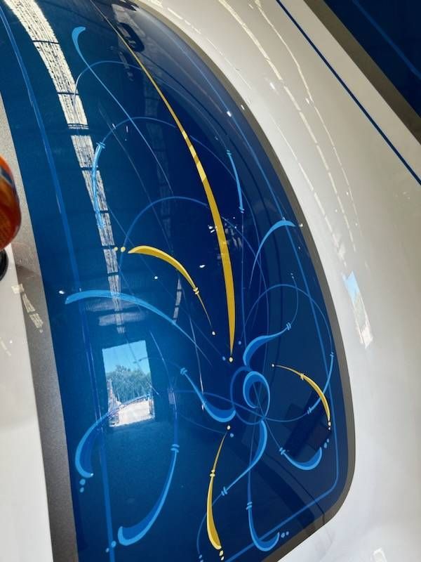 white and blue truck with hand painting — Murals & Hand Painted Signs in the Albury-Wodonga, NSW