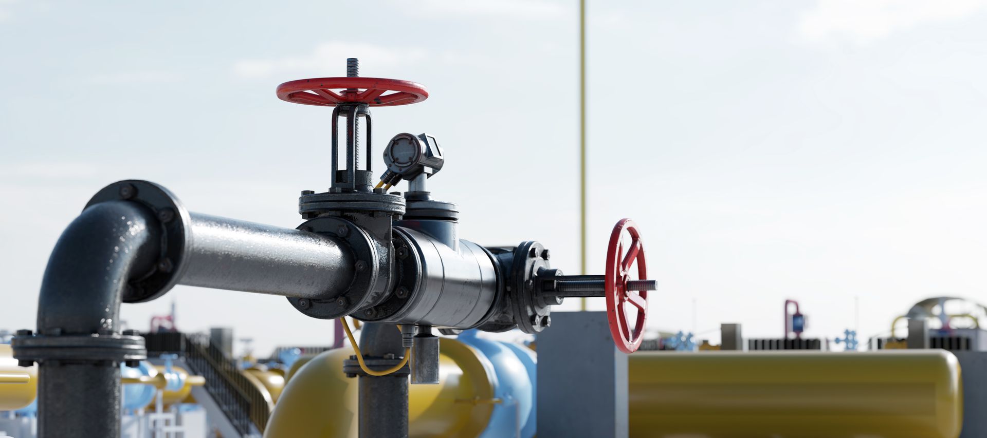 A close up of a gas pipe with a red valve on it.  Gas pipe installation in Gresham OR