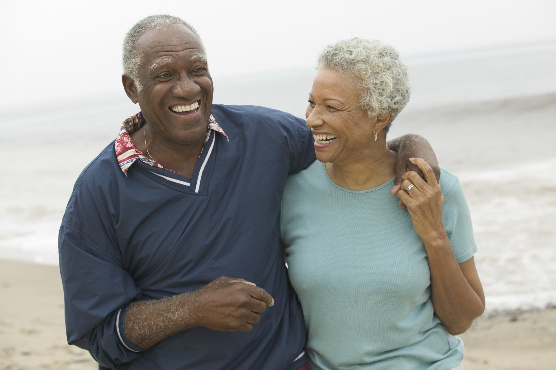 mature-happy-couple-at-the-beach