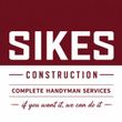 SIKES Construction logo on red background with &ldquo;Complete Handyman Services&rdquo; and slogan text