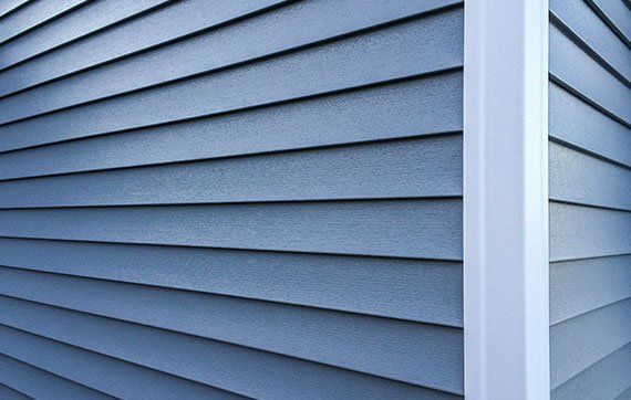 Blue Vinyl Siding — Springfield, MO — Diamond Exteriors