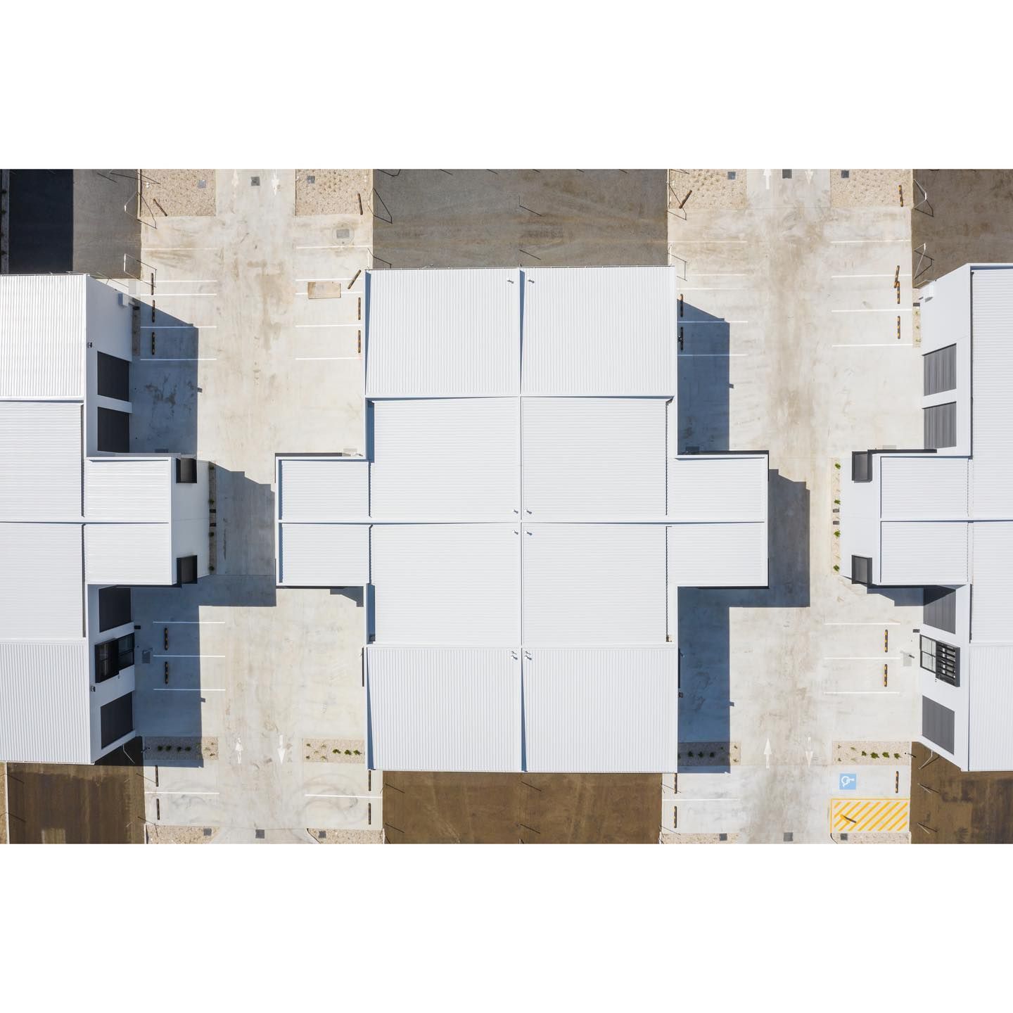 An Aerial View of a Row of White Tents in a Parking Lot — Northern Rivers Metal Roofing PTY LTD In Ewingsdale, NSW