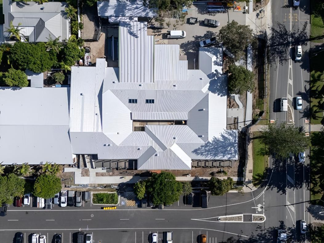 Aerial View of a Building With a Complex White Roof — Northern Rivers Metal Roofing PTY LTD In Ewingsdale, NSW