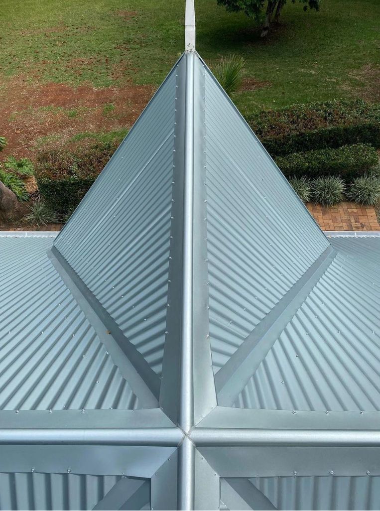 A Close Up of a Roof of a Building With a Pyramid Shaped Roof — Northern Rivers Metal Roofing PTY LTD In Ewingsdale, NSW