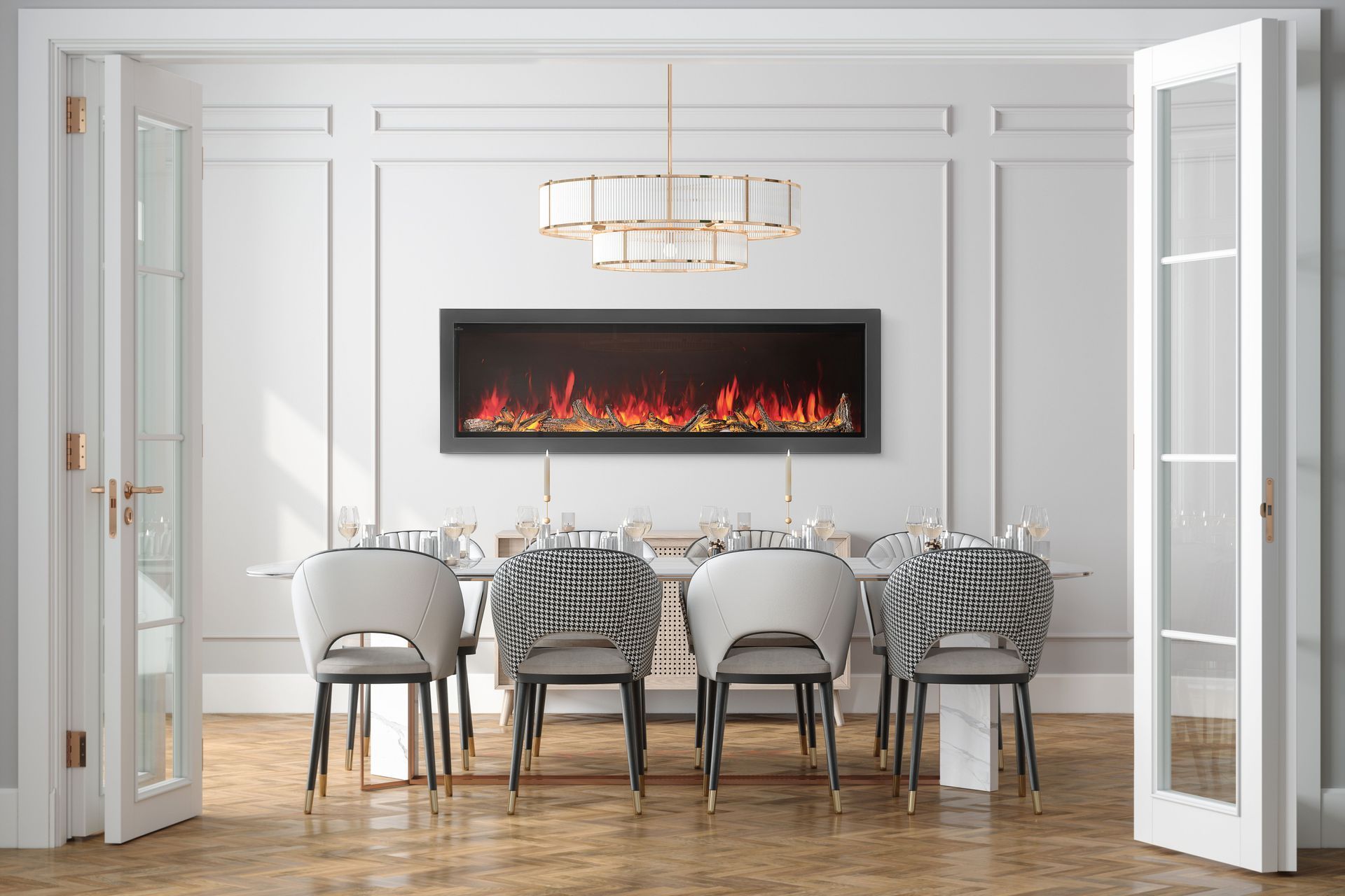 Elegant dining room with chandelier, fireplace, round table, and open French doors