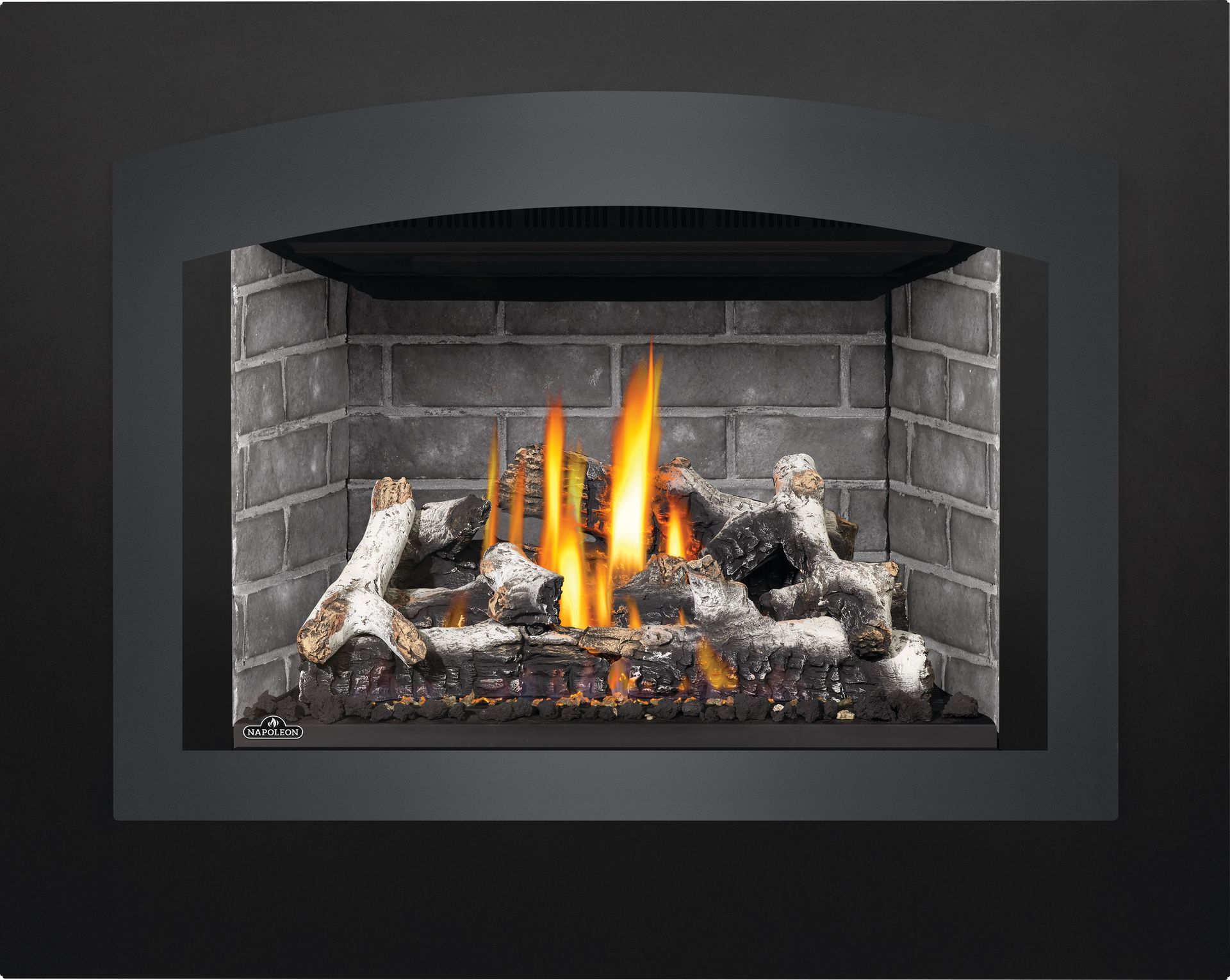 A fireplace with a lot of fire in it.