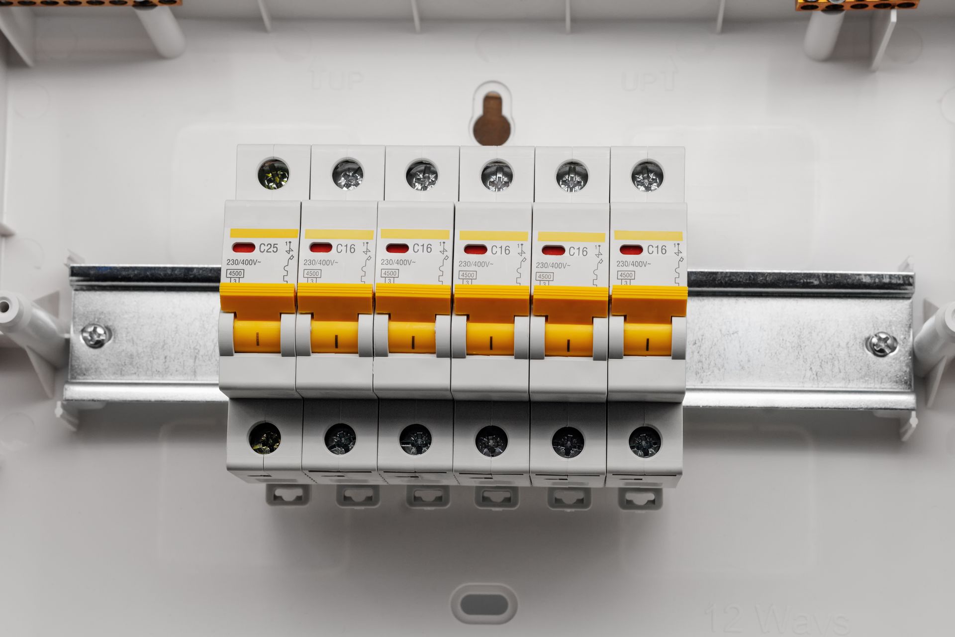 A close up of a circuit breaker in a box.