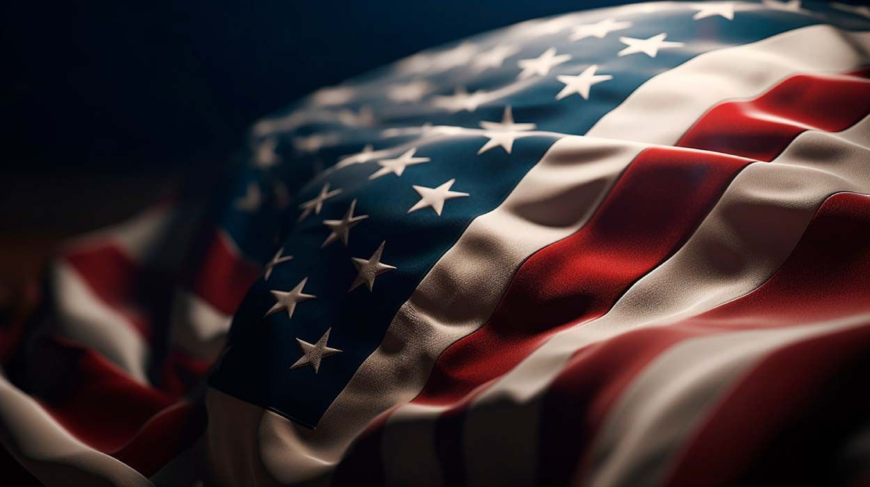 Close-up of a rippling American flag with stars and red and white stripes