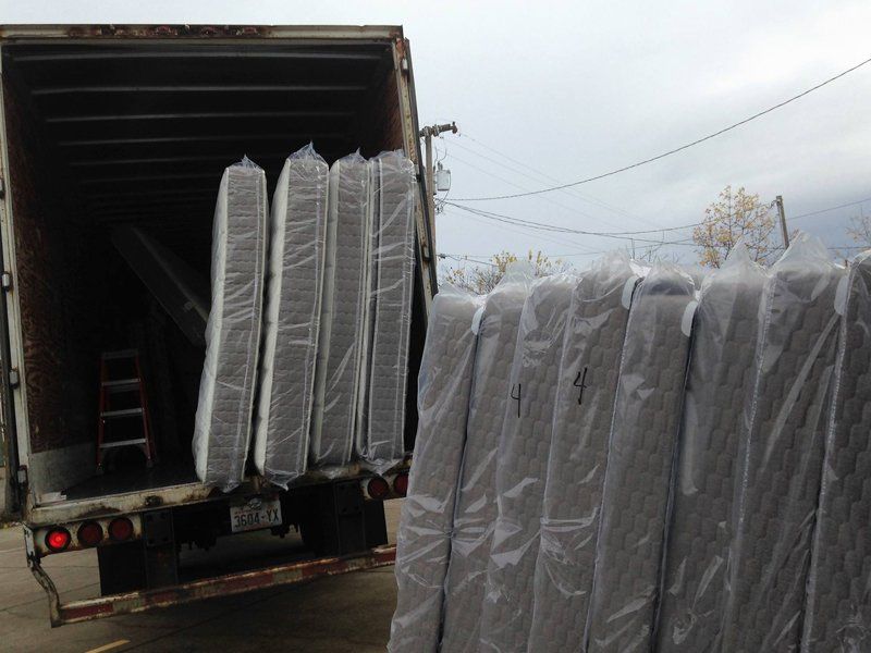 Loading Mattresses In Truck