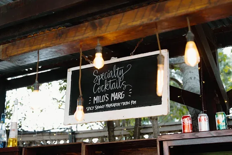 Rustic café chalkboard sign reading