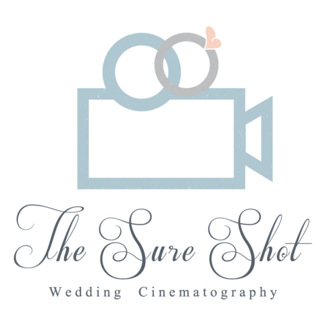 Logo for The Sure Shot Wedding Cinematography with pastel blue camera icon and intertwined rings