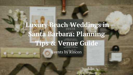Luxury beach wedding planning guide title on a rustic tabletop with flowers and stationery
