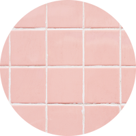 A close up of a pink tile floor in a circle.