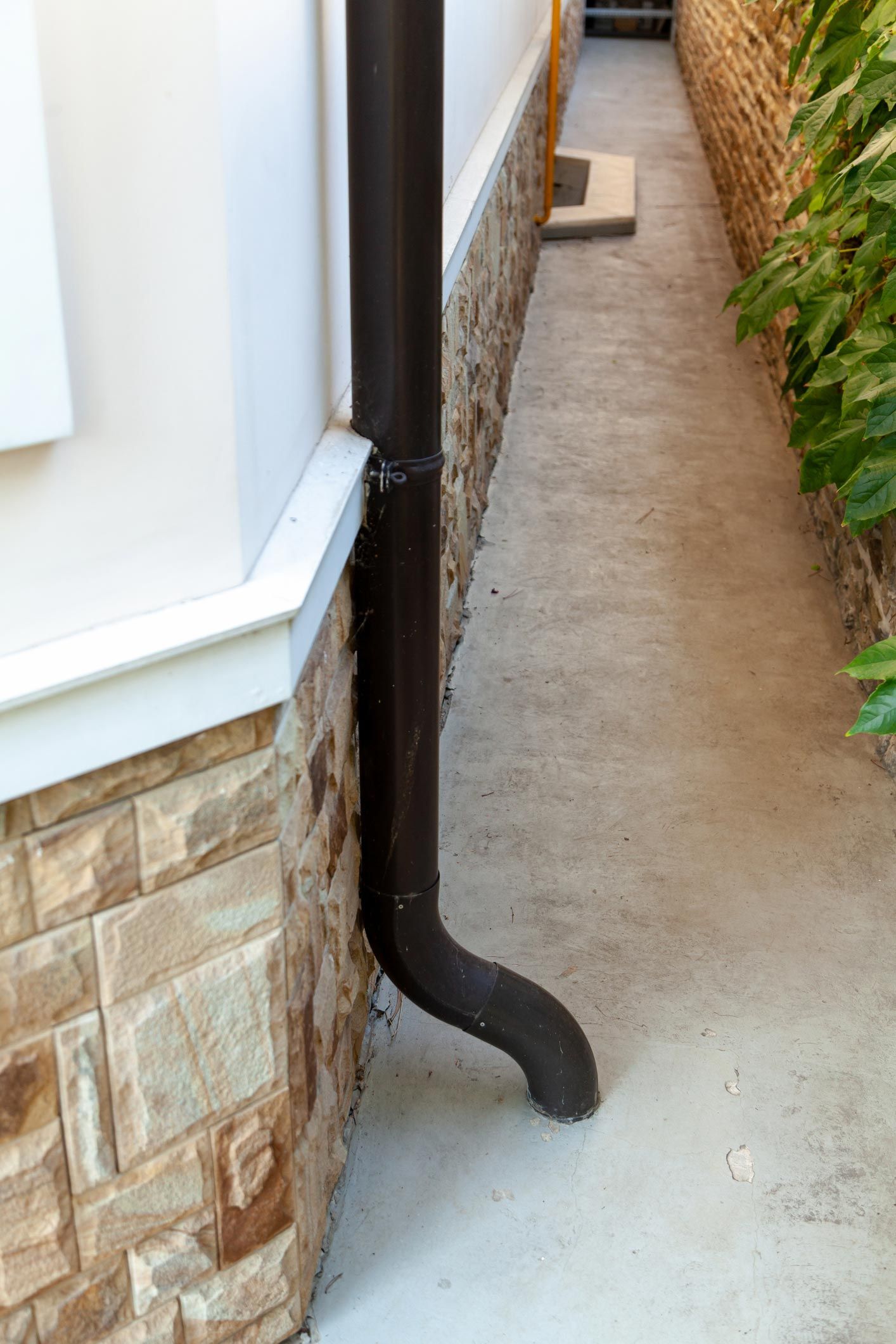 Drainpipe Runs Along Wall — Berlin, MD — Eastern Shore Gutters Drainpipe Runs Along Wall — Berlin, MD — Eastern Shore Gutters